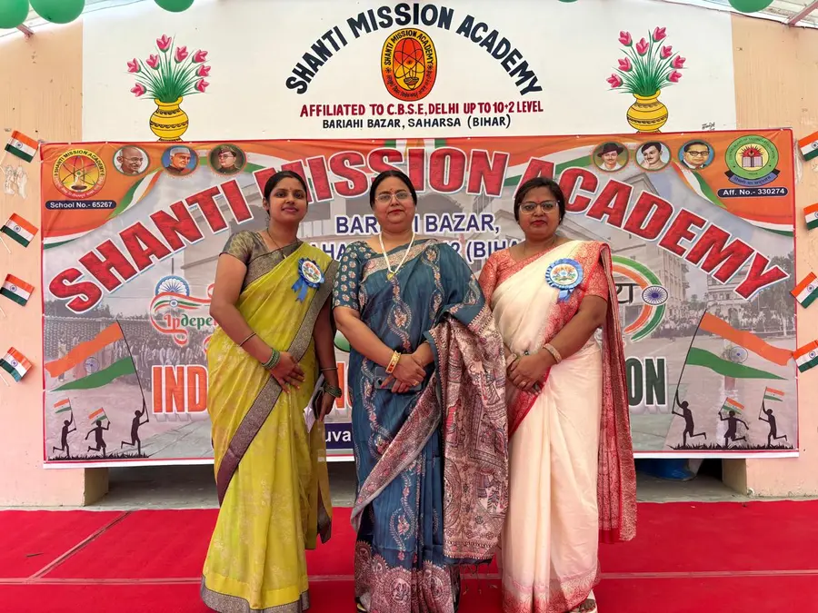 Staff at the school banner